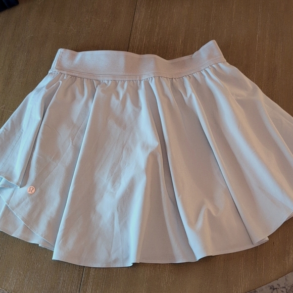 lululemon athletica Dresses & Skirts - Lululemon Court Rival HR Skirt 4" Liner Dual Pockets Tennis Athleisure  Size 6